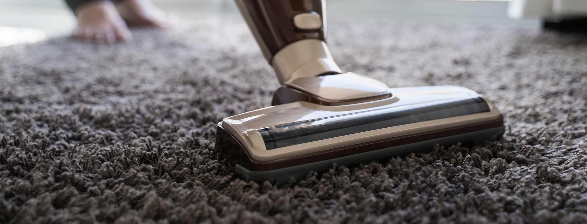 Round patterned rug being scrubbed