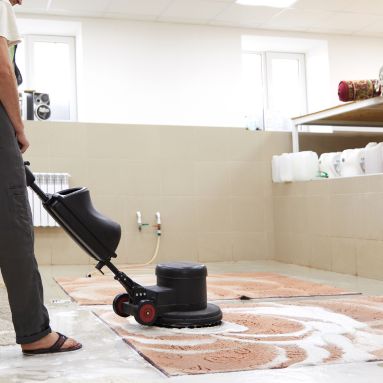 DryMax technicians using protective mat before entering home